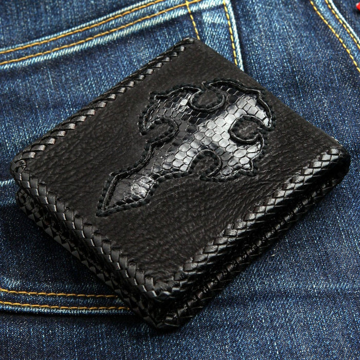 Angled shot highlighting the handmade leather braiding and exotic cross detail