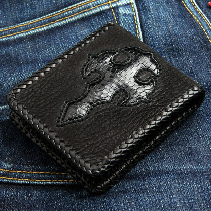 Angled shot highlighting the handmade leather braiding and exotic cross detail
