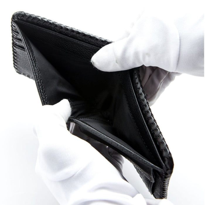 Close-up view of the bill and receipt slots inside the handmade leather wallet