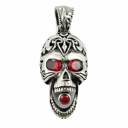 Front view of Sterling Silver Gothic Skull Pendant with red garnet eyes and tribal filigree details