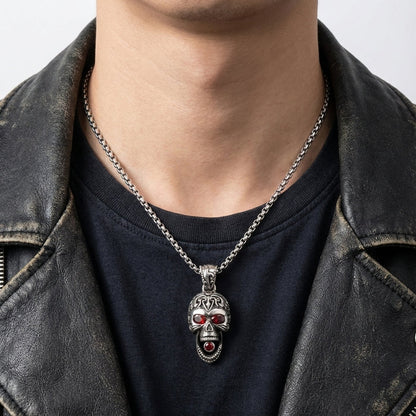 Biker wearing Gothic silver skull pendant on silver chain with leather jacket