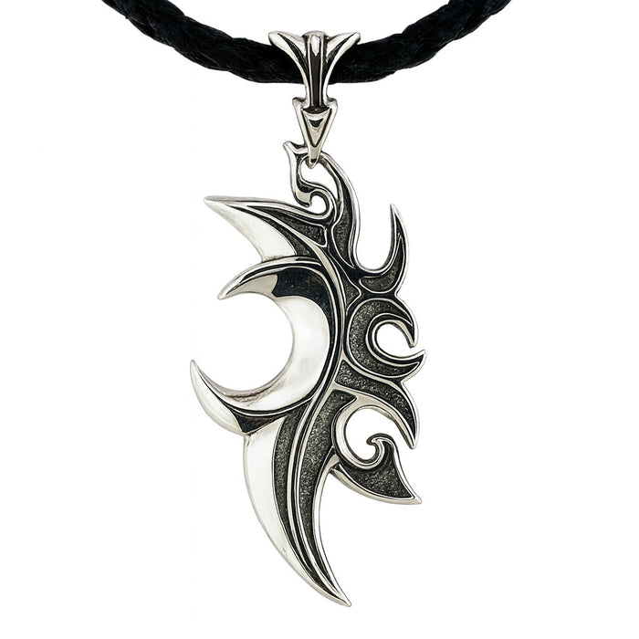 The silver tribal flame pendant shown on a black leather necklace.