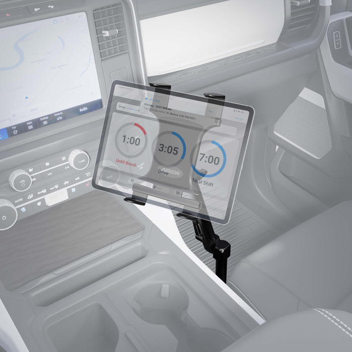 The Heavy-Duty Car or Truck Seat Rail Tablet Mount with 22 Arm holds a tablet inside a vehicle, showing a driving log app with timers—Until Break, Drive, and Total Shift—while dashboard controls and a map are visible in the background.
