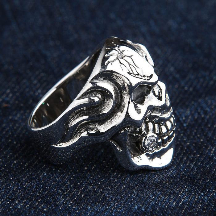 A close-up of the skull ring's diamond accent tooth and empty eye socket.