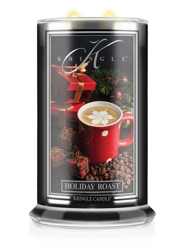 Kringle Candle with holiday design featuring a red mug and gift box on a black background.