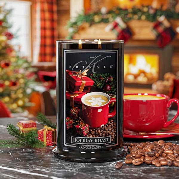 Kringle Candle in a festive setting with Christmas decorations and coffee-themed label.