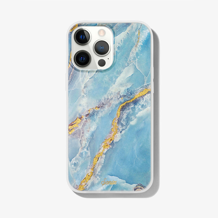 blue marble with gold glitter metallic veins shown on an iphone 13 pro max