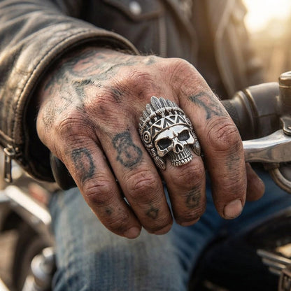 A heavy sterling silver Indian skull ring weighing 35 grams on hand