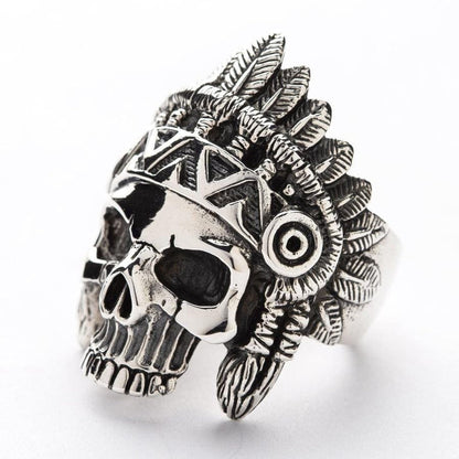 A bold biker ring featuring an Indian chief skull design with intricate hand-carved feather details.