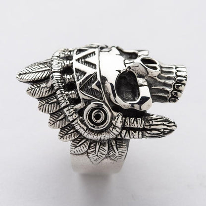 Detail of the dark oxidized finish on a silver Indian chief ring, which highlights the incredible texture of the feathers.