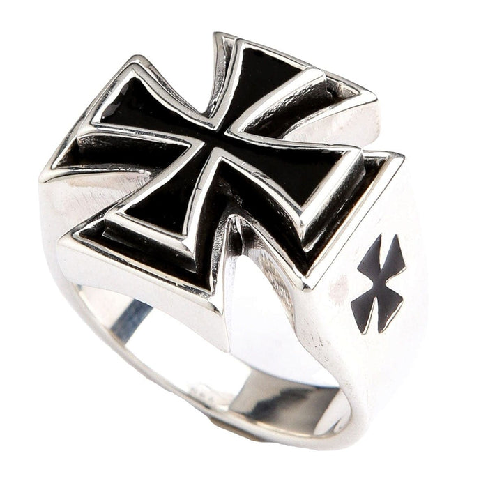 A close-up shot showing the high-contrast between the polished silver and deep black enamel on the iron cross ring.