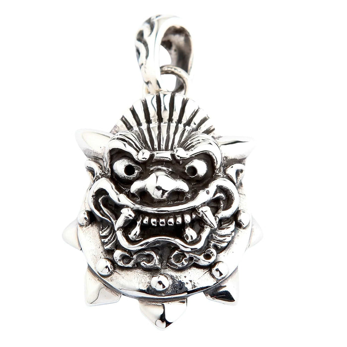 Front view of solid .925 sterling silver Japanese Oni mask pendant featuring furrowed brow, bared fangs, and oxidized details