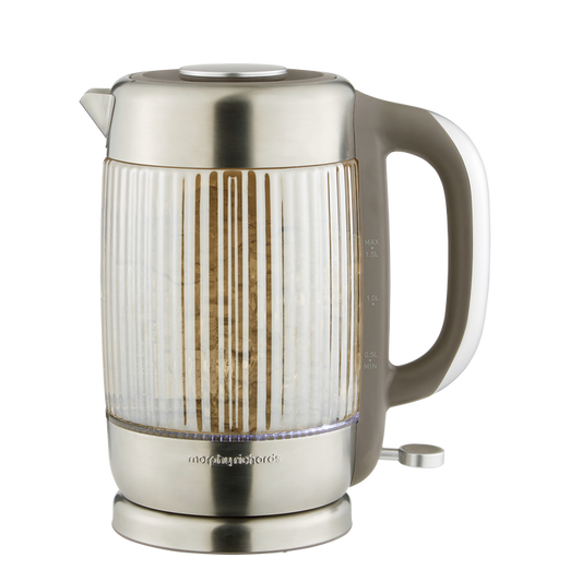 Ribbed glass kettle on a white background