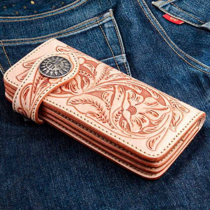 Angled view of light brown floral tooled leather western biker wallet with silver snap