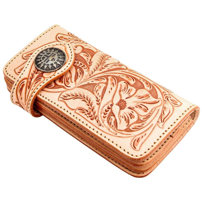 Side profile of tooled leather wallet highlighting deep relief carving