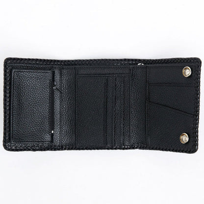 Open trifold interior lined in black cowhide, showing the card slots, zippered pocket and two silver snap studs.