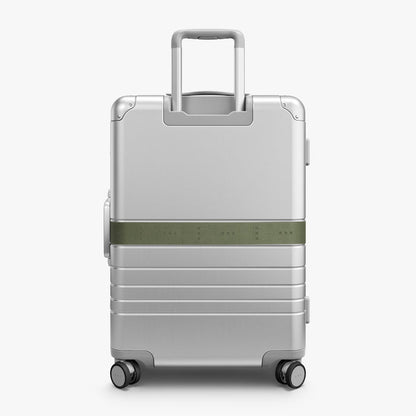 Olive Green | Back view of Aluminum suitcase with the Olive Green Luggage Strap secured around it