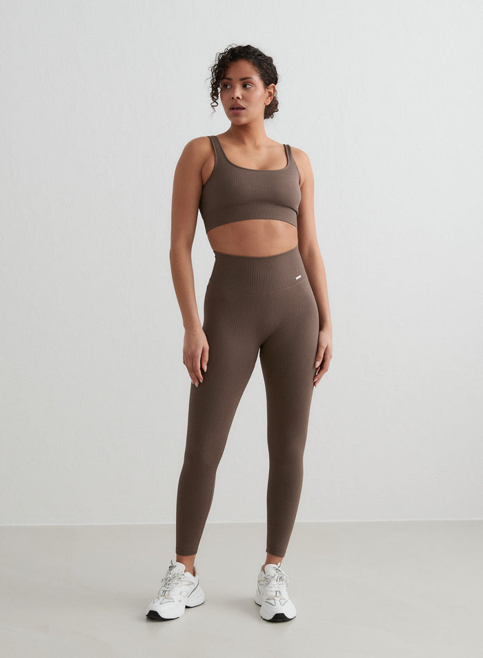 Macchiato brown aim'n Ribbed Seamless Petite Tights and matching sports bra with a second skin feel.
