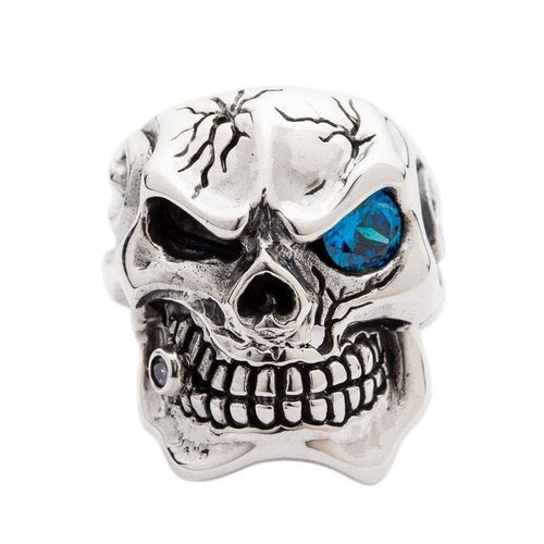 Mafia skull ring front view showing blue topaz CZ eye and diamond tooth in sterling silver