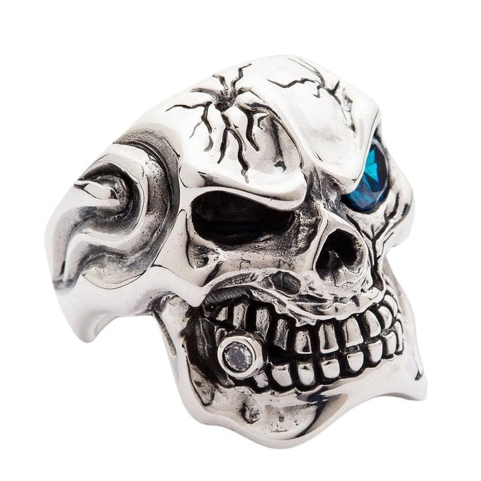 Side profile of skull ring showing diamond CZ tooth accent and oxidized ear swirl design