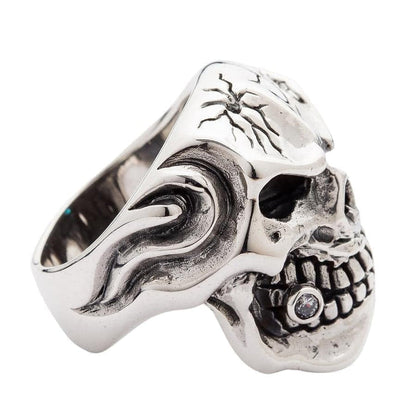 Right angle view of 925 silver skull ring showing diamond tooth and empty eye socket