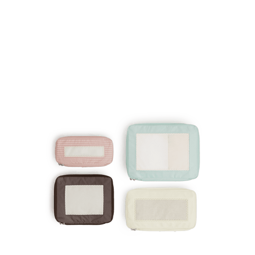 Set of Four / Multi Scaled | Set of four top view of Monos x Reformation compressible packing cubes in Multi colors