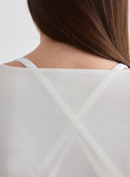 Back detail of the Off White Luminous Draped Long Sleeve featuring a small aim'n logo [L-174cm]