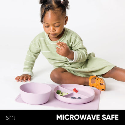 Silicone toddler dinnerware set in light purple with matching placemat, child wearing sage green shirt, microwave safe products displayed