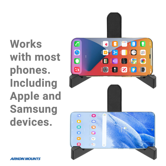 Two smartphones—one Apple, one Samsung—sit on black Portable Tablet/Phone Stands in landscape orientation. Text reads: Works with most phones, including Apple and Samsung. The perfect portable stand for any setup.