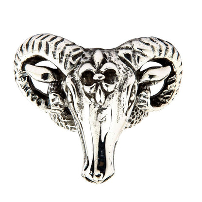 Front view of the sterling silver Ram Head Ring showcasing curled ridged horns and a prominent forehead emblem.