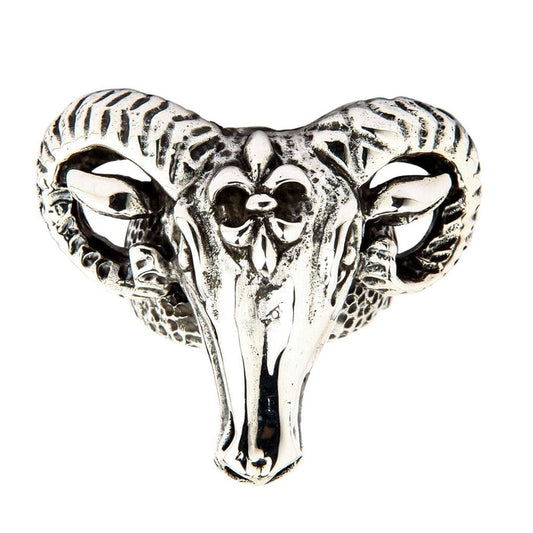 Front view of the sterling silver Ram Head Ring showcasing curled ridged horns and a prominent forehead emblem.