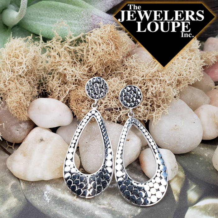 Our Sterling Silver dot design open pear shape drop earrings, handcrafted in Bali by our skilled artisans. From our Thai Tribal™ collection, a completely artisan crafted, intricate, sterling silver collection inspired by the dreamscapes of Thailand.