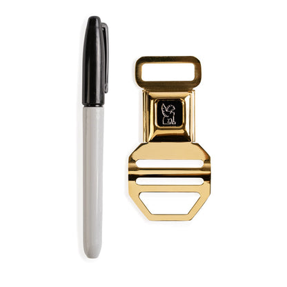A sharpie for scale by the new SM Buckle in the Gold color #color_gold