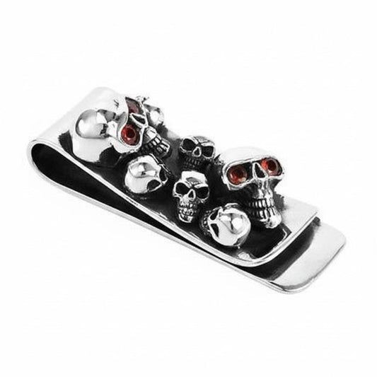 An angled, three-quarters view of the handcrafted silver skull money clip.