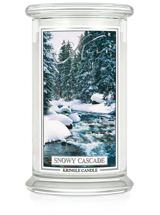 Kringle Candle jar with snowy landscape design on a white background
