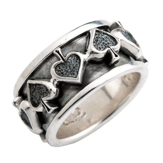 An angled view of the gothic spinner ring, showing the raised spade card suit symbols.