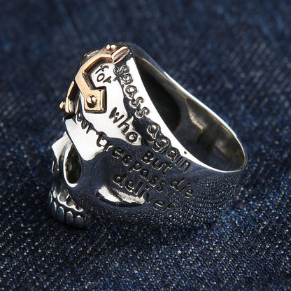 An alternative angle of the men's statement faith ring with a skull and cross.