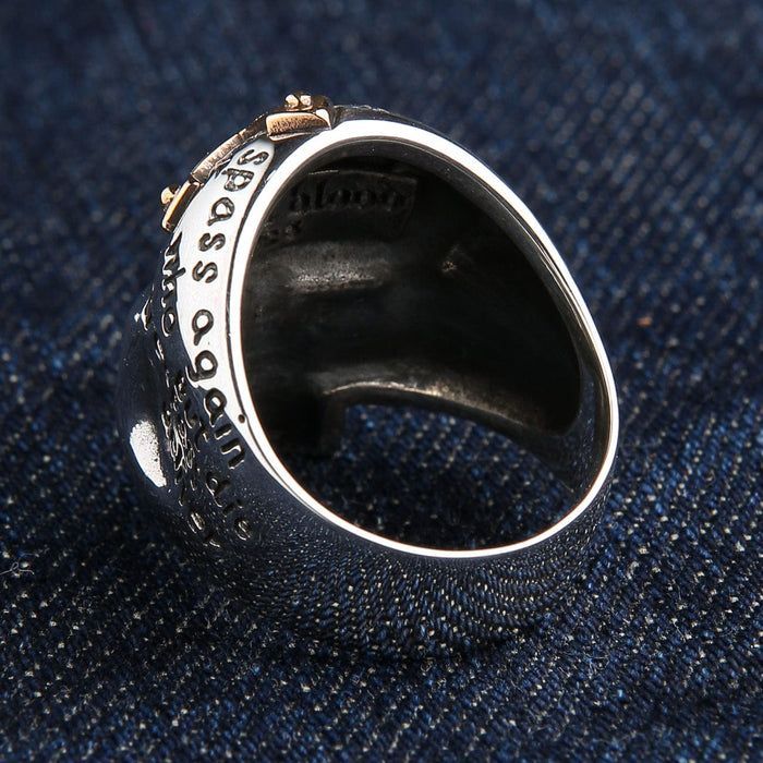 The inside of the heavy silver prayer ring, showing its solid construction and 925 stamp.