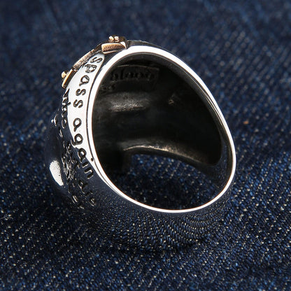 The inside of the heavy silver prayer ring, showing its solid construction and 925 stamp.