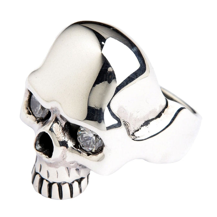 A highly polished sterling silver skull ring with two large, sparkling CZ diamond eyes.