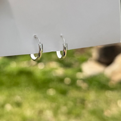 Sterling Silver hoop earrings. 16 mm wide. 3 mm thick (non ear part)