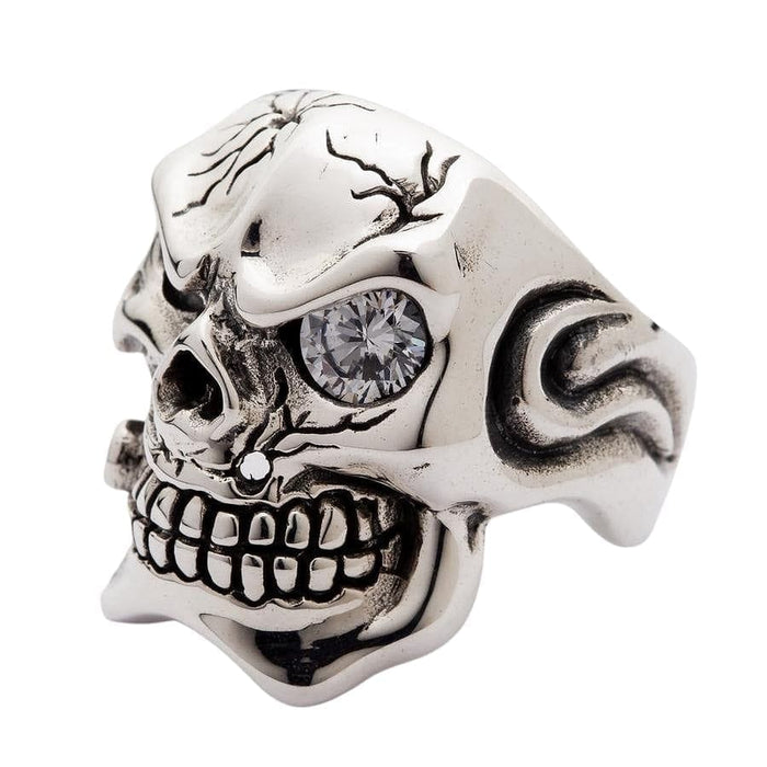 The side profile of the mafia skull ring, highlighting the detailed flame carvings on the band.