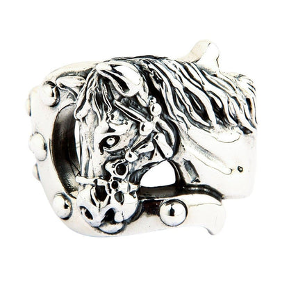 Front face of the sterling silver Rocker Horse Ring featuring a detailed horse head within a studded horseshoe frame