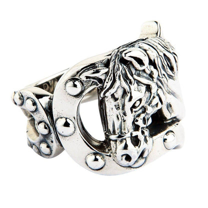 Angled close-up highlighting the textured horse mane and studded horseshoe frame of the .925 sterling silver ring.