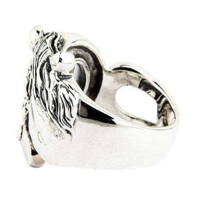 Rear view displaying the smooth polished inner band and hollowed back of the solid silver equestrian ring face.