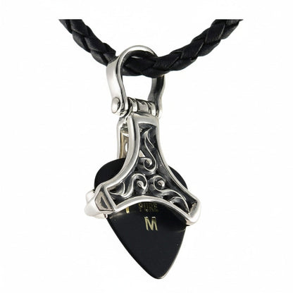 The sterling silver tribal guitar pick holder necklace shown on a white background with a black pick inside.