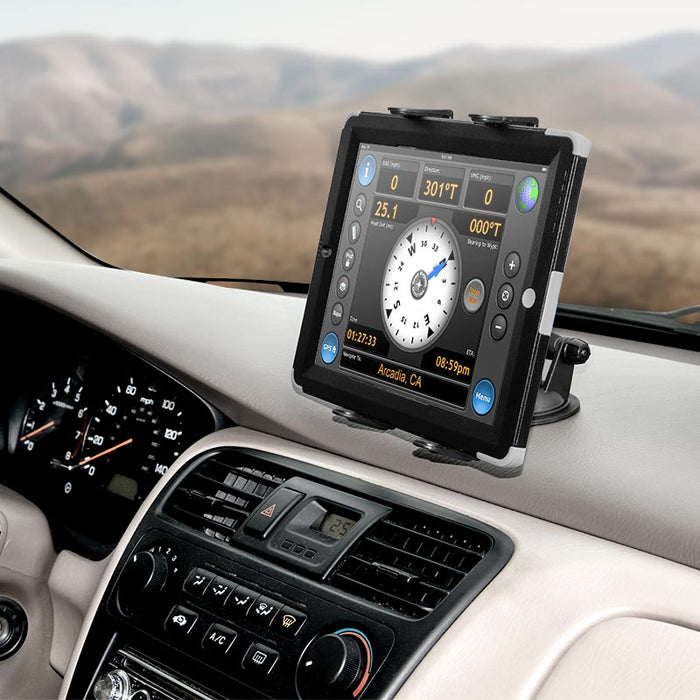 A Sticky Suction Windshield or Dash Slim-Grip® Tablet Mount securely holds an iPad on the car dashboard, displaying aviation navigation software with gauges and dials, while the cars controls and speedometer are visible.