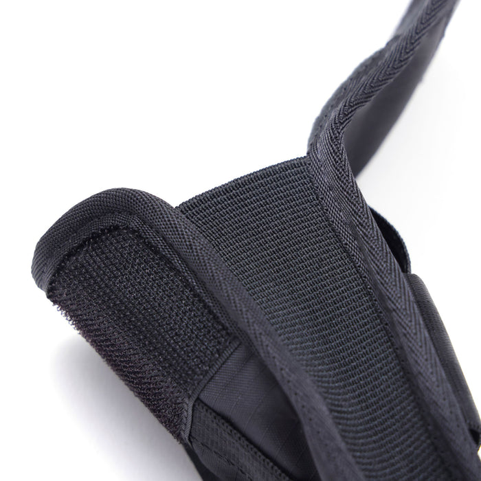 The side gusset of the Sunglass Pouch in black
