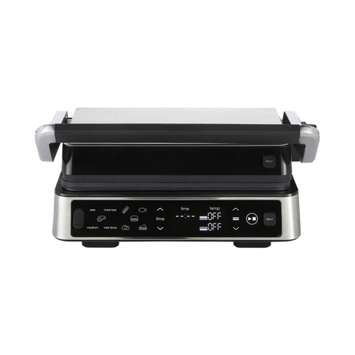 Black and silver grill with digital controls on a white background