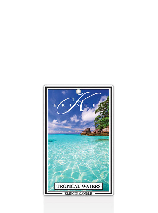 Kringle Candle Tropical Waters air freshener with a beach scene on a white background